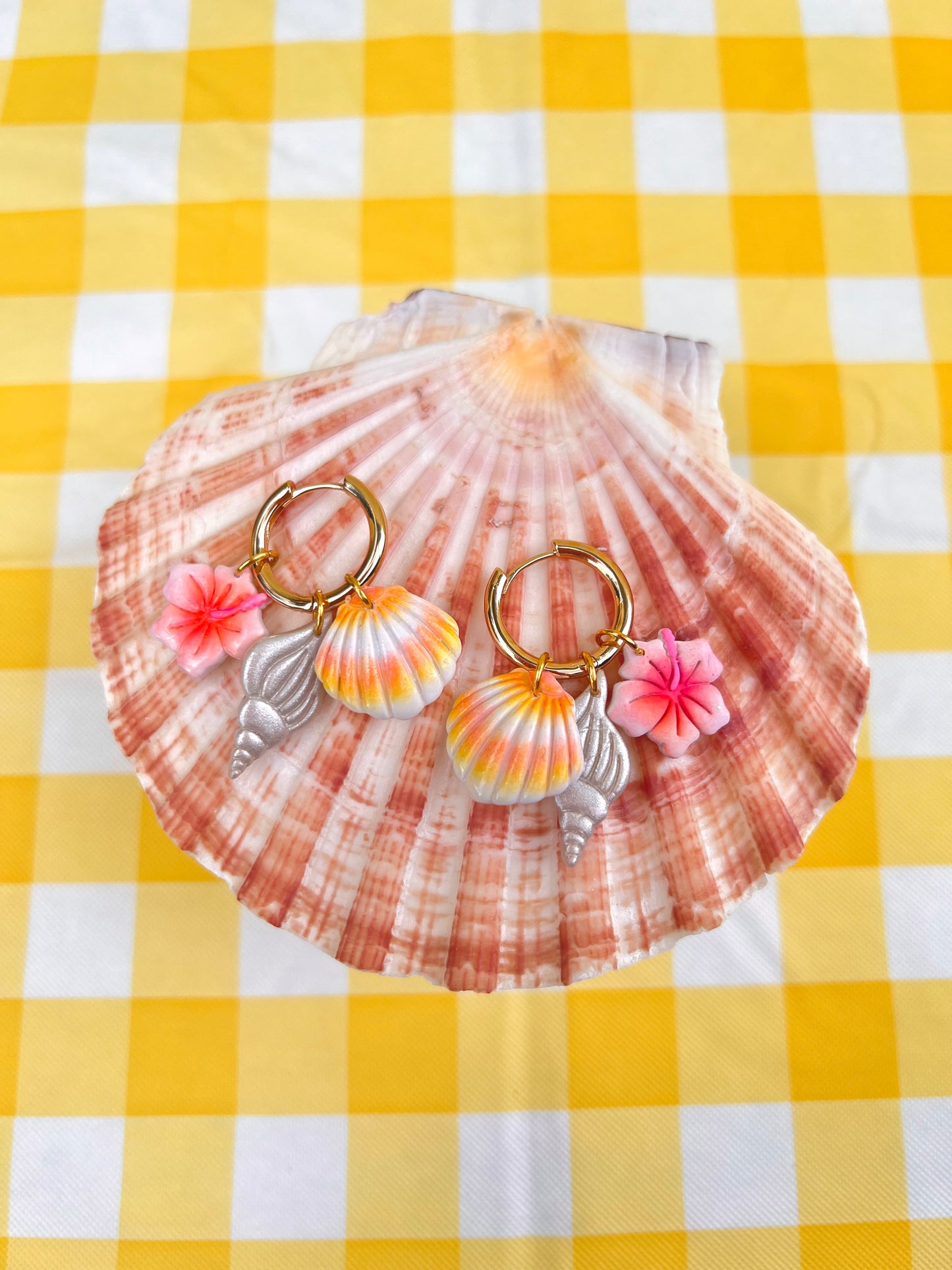 Shell hunting charm earrings