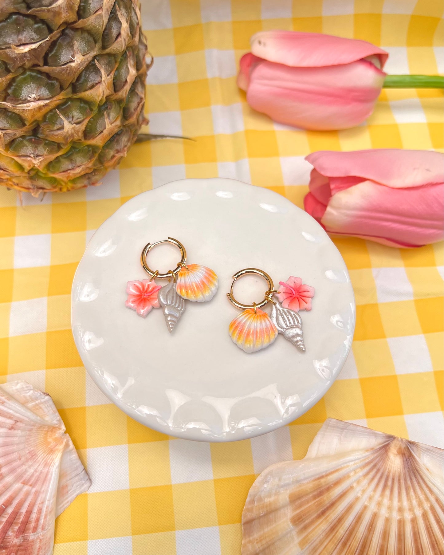Shell hunting charm earrings